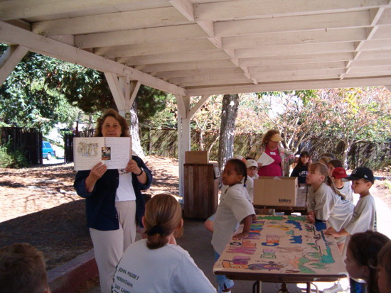 Sue shows sketchbook from AK 2nd week 1sy day August 9, 2004 005
