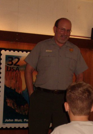 Ranger David Blackburn gives a tour of Muir House.jpg
